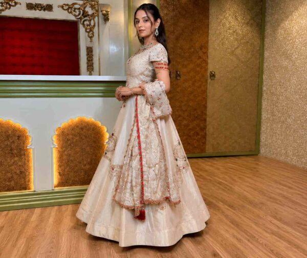 Designer Off White Lehenga Choli with Zari Thread and Stone Embroidery Front View