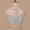 Powder Blue Designer Blouse Back View in USA Graceful Powder Blue Lehenga with Pearl Accents in USA Back View Blouse